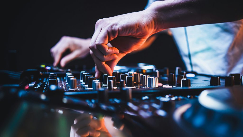 DJ Butters mixing on a controller mid-set